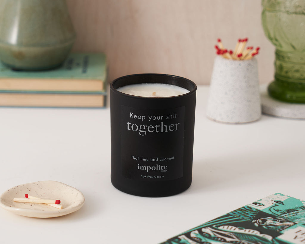 medium lime and coconut handmade soy wax scented candle positive affirmation gift in black glass