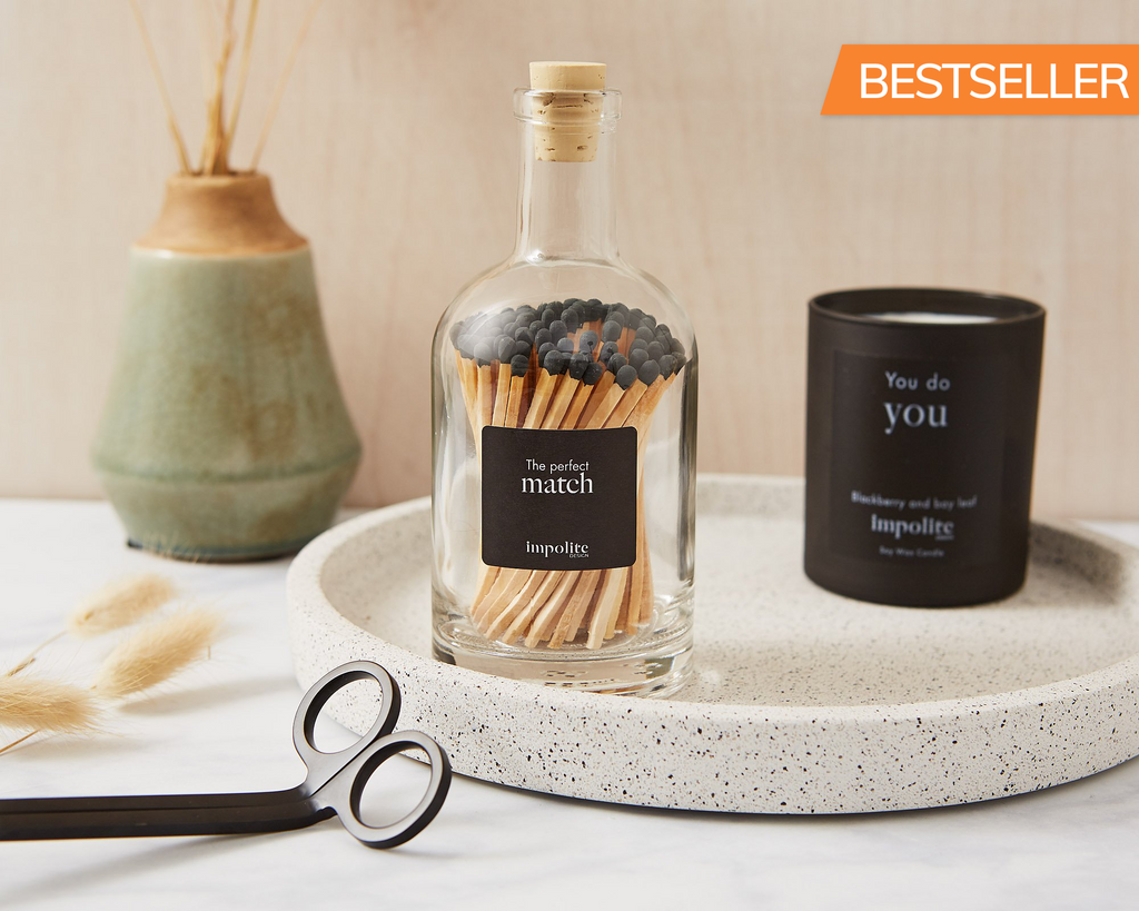 Glass Bottle of stylish black coloured extra long safety matches for candles